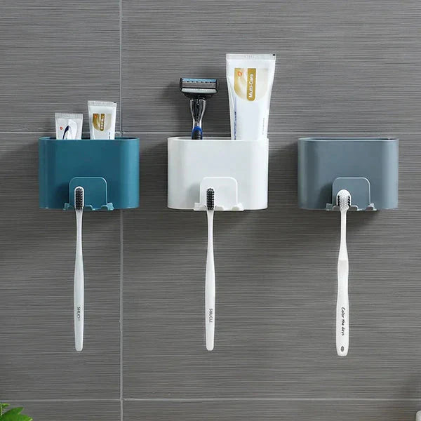 Wall mounted bathroom organizer for tooth paste and tooth brush